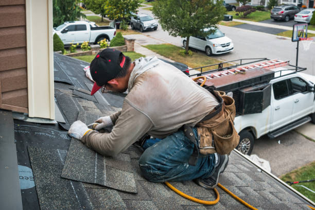Professional Roof Repair technician working in Dunkirk, OH